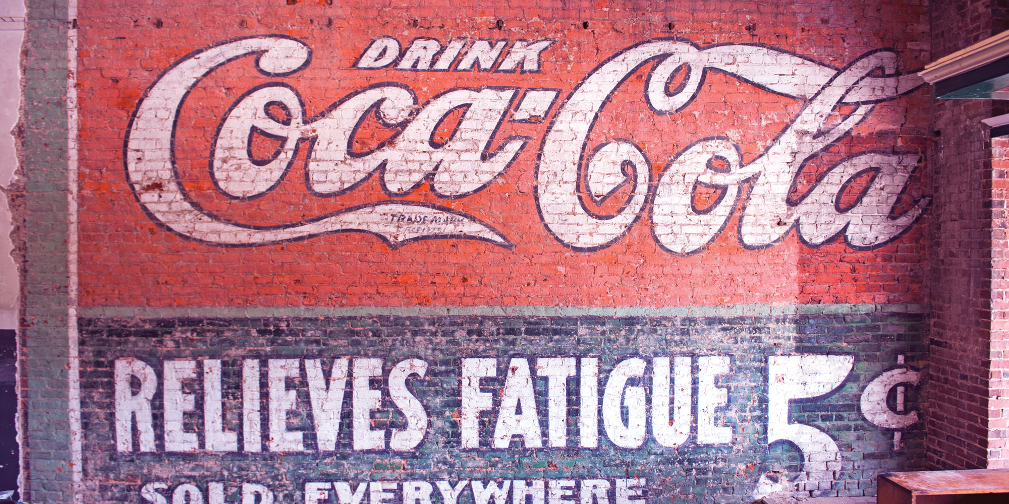 A sip of history: Smith T Building Supply to hold formal unveiling of Coca-Cola painting