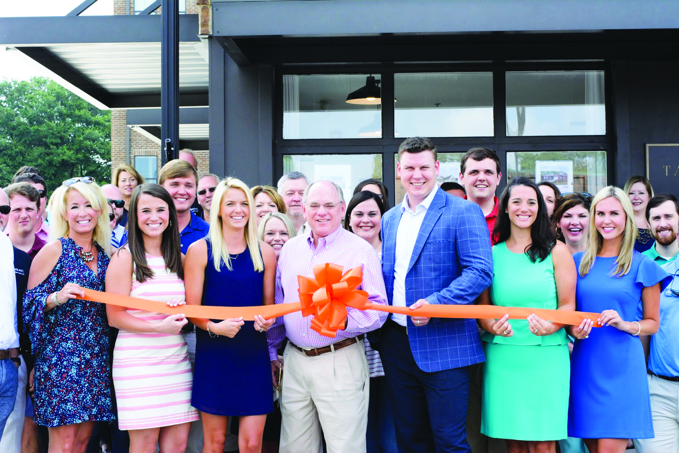 Local real estate, development firm holds grand opening Auburn Friday