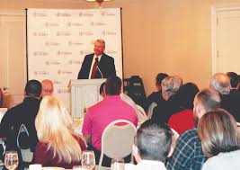 Dr. Mark Neighbors speaks at ‘Business over Breakfast’ event