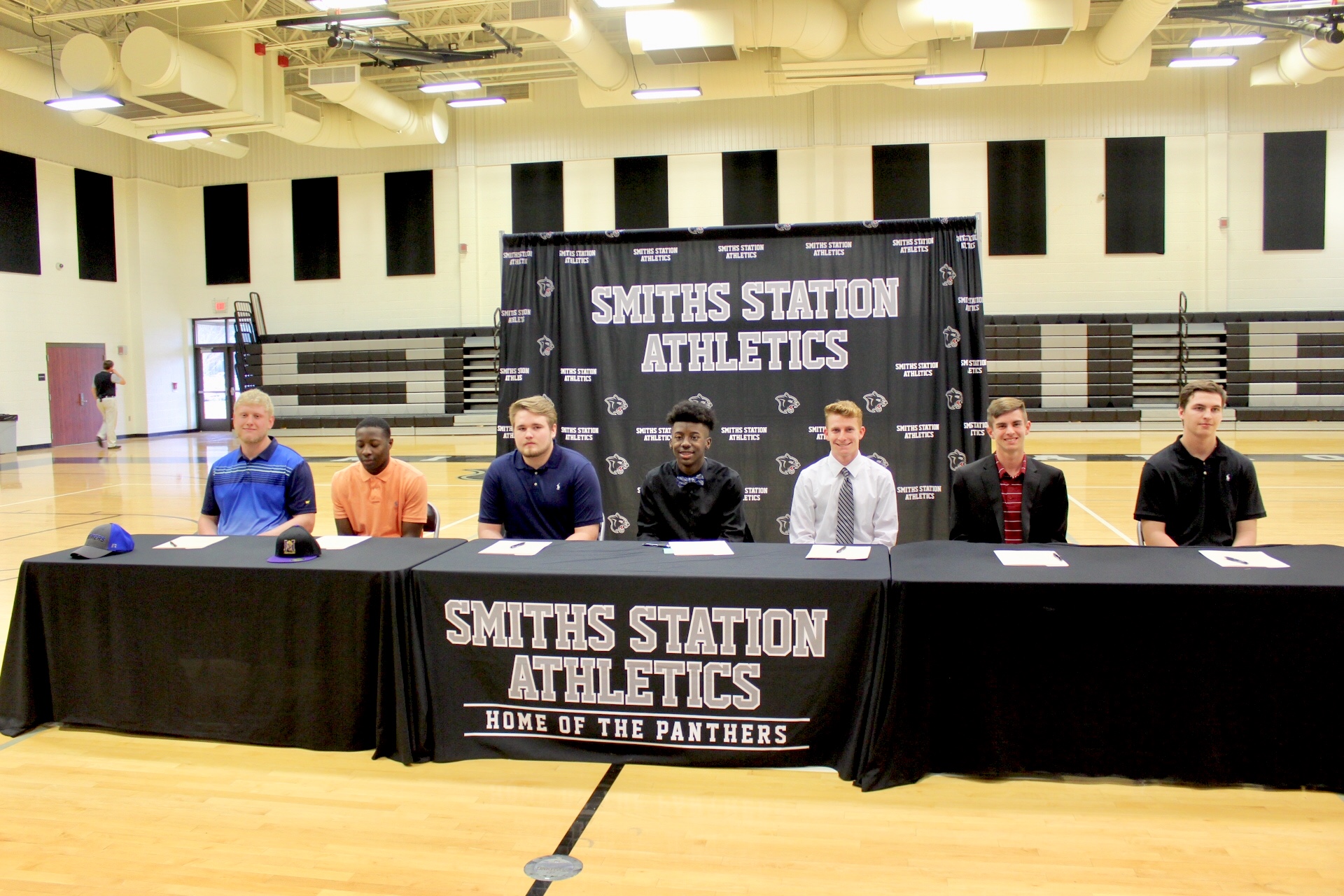 Seven Smiths Station athletes ink scholarships this morning