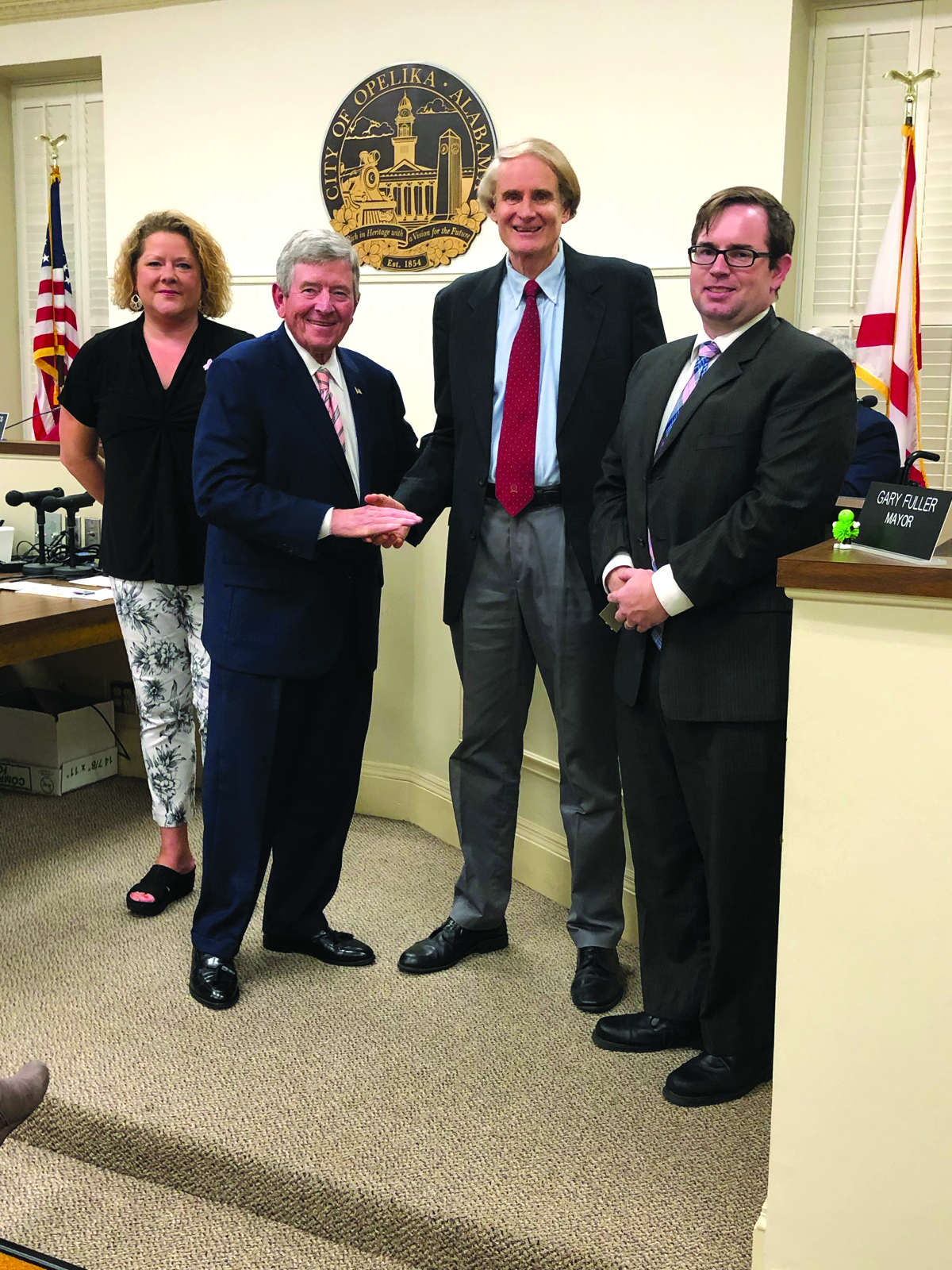 Opelika City Council honors three employees for 25 years of service to the city