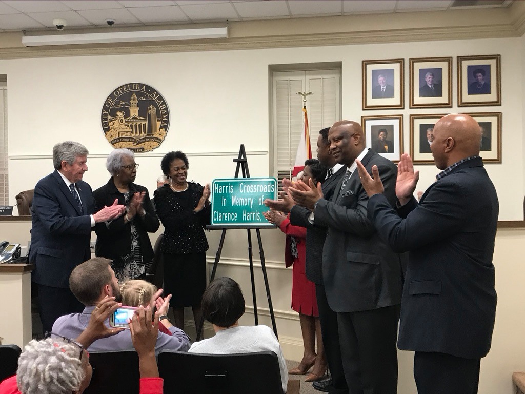 Opelika City Council unveils a new sign in memory of Clarence Harris, Jr.