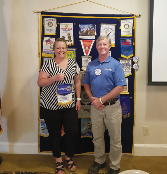Incoming Rotary President Dixie Broadwater speaks to club