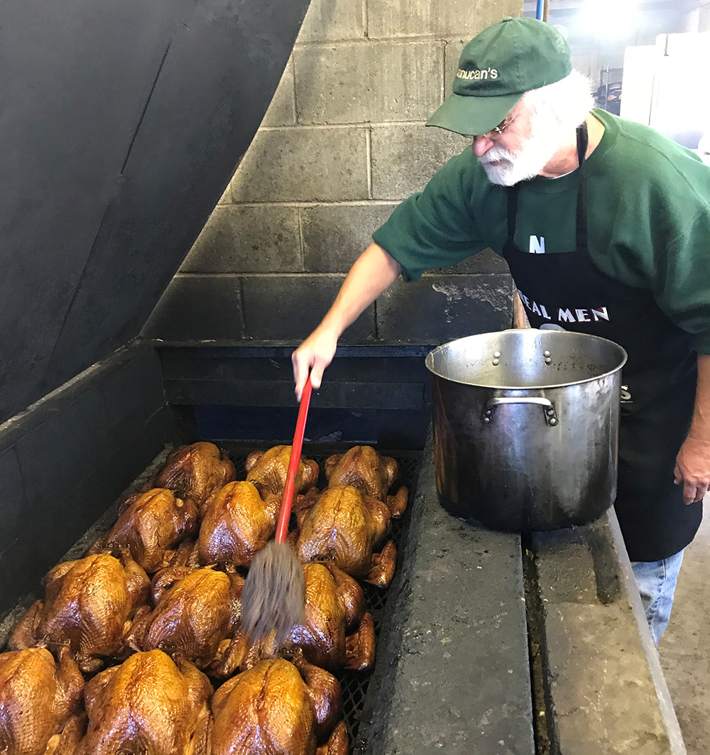 Auburn Civitans Smoke Turkeys and Hams for Thanksgiving and Christmas