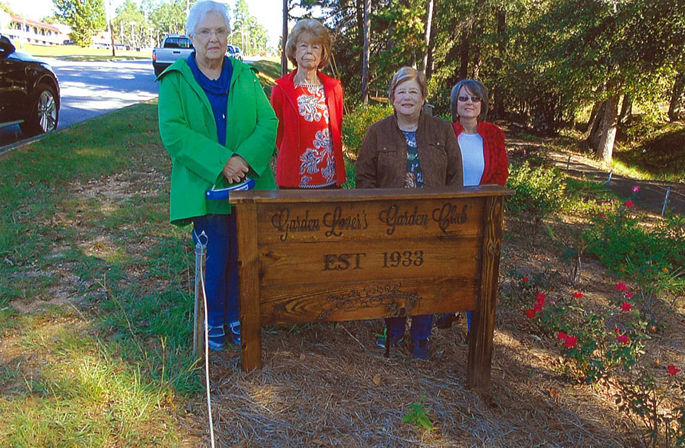 Garden Lovers Club installs sign giving recognition to the nearly   100-year-old organization