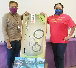 Sisters of Promise Chapter donates bike, scooter to DHR