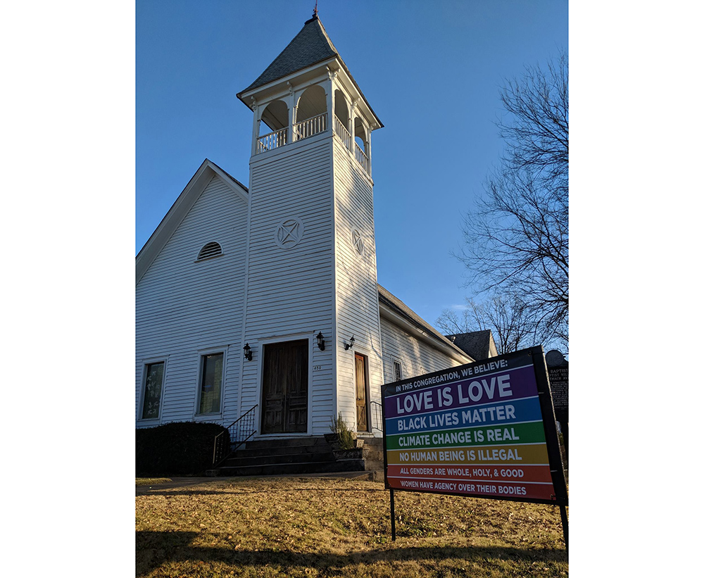 Religious sign professing love stolen from area faith community