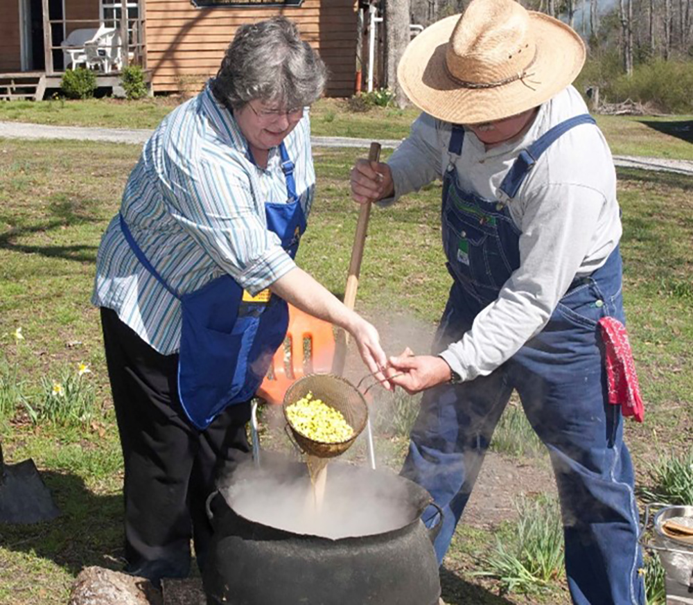 Second Saturday at Pioneer Park. . . making hominy