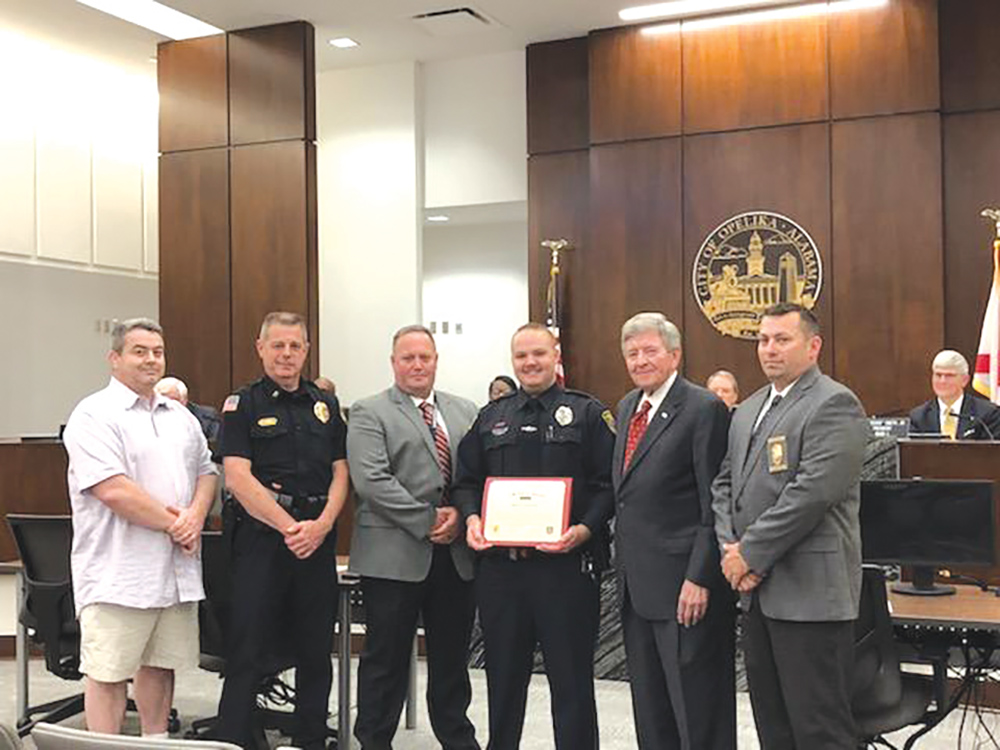 Opelika Police Officer Grant Gow honored at city council