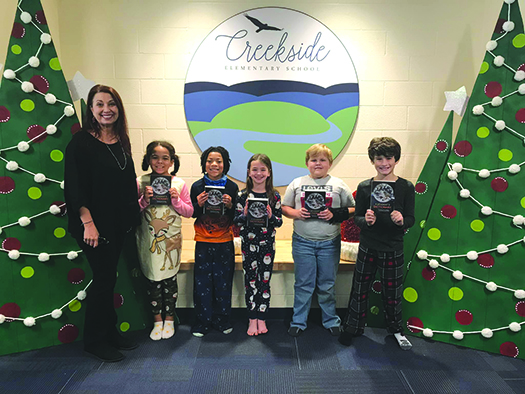 Auburn Rotary Club Delivers books to Third Grade Students 