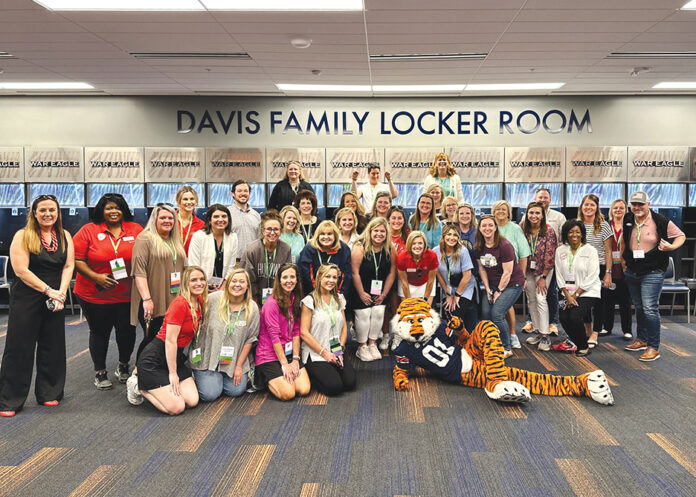 Group at AU Football Facility