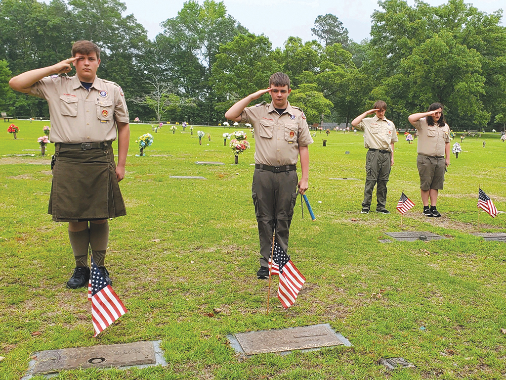Local Scouts Place Flags in Cemetery for Memorial Day