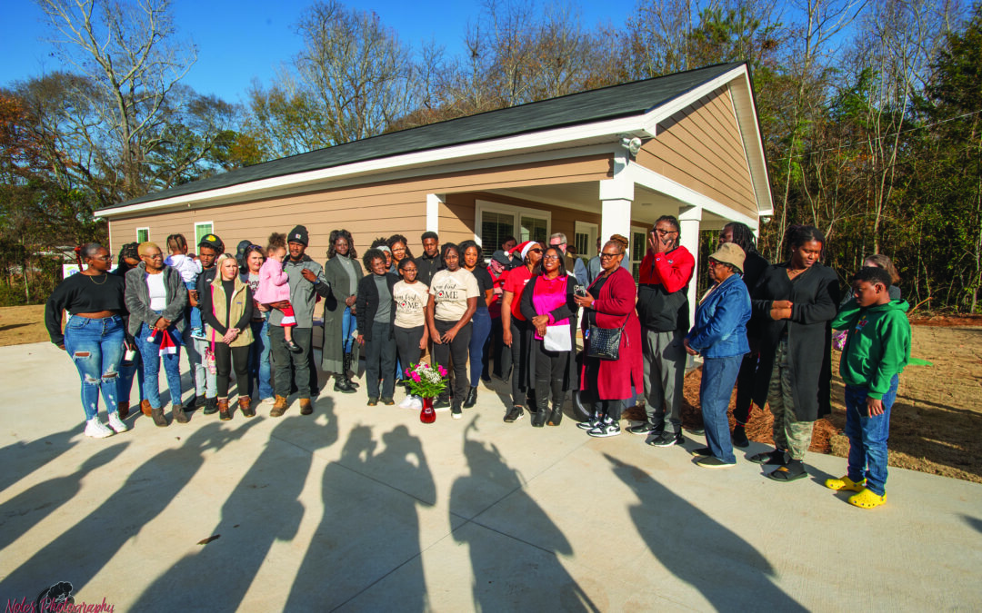 Three families to spend Christmas in new Habitat homes