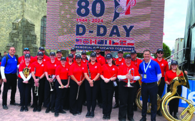 AU band director, students in D-Day parade in Normandy