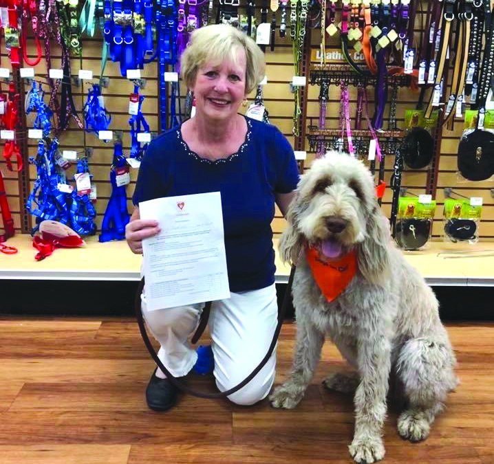 Mia the therapy dog brightens spirits at Spencer Cancer Center