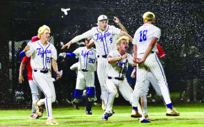 Tigers roll past Red Devils in semifinal sweep