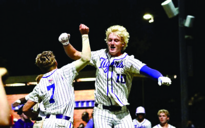 Sheppard shines as Tigers top the Trojans