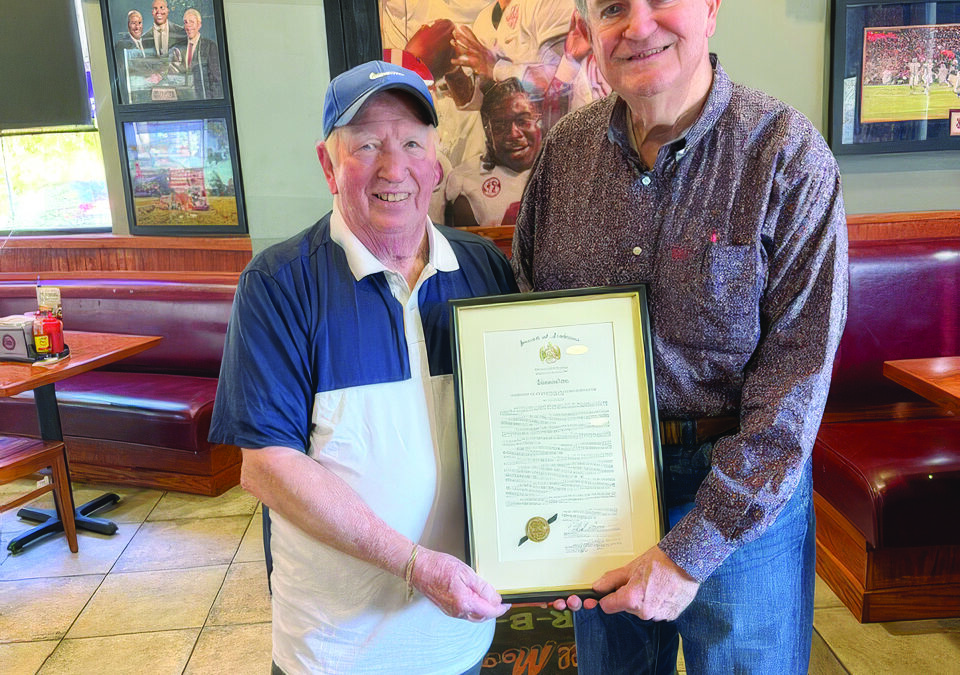 Guy Rhodes honored for lifetime of journalism, community service